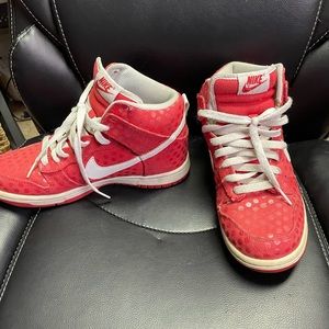 Red polka dot Nike high tops